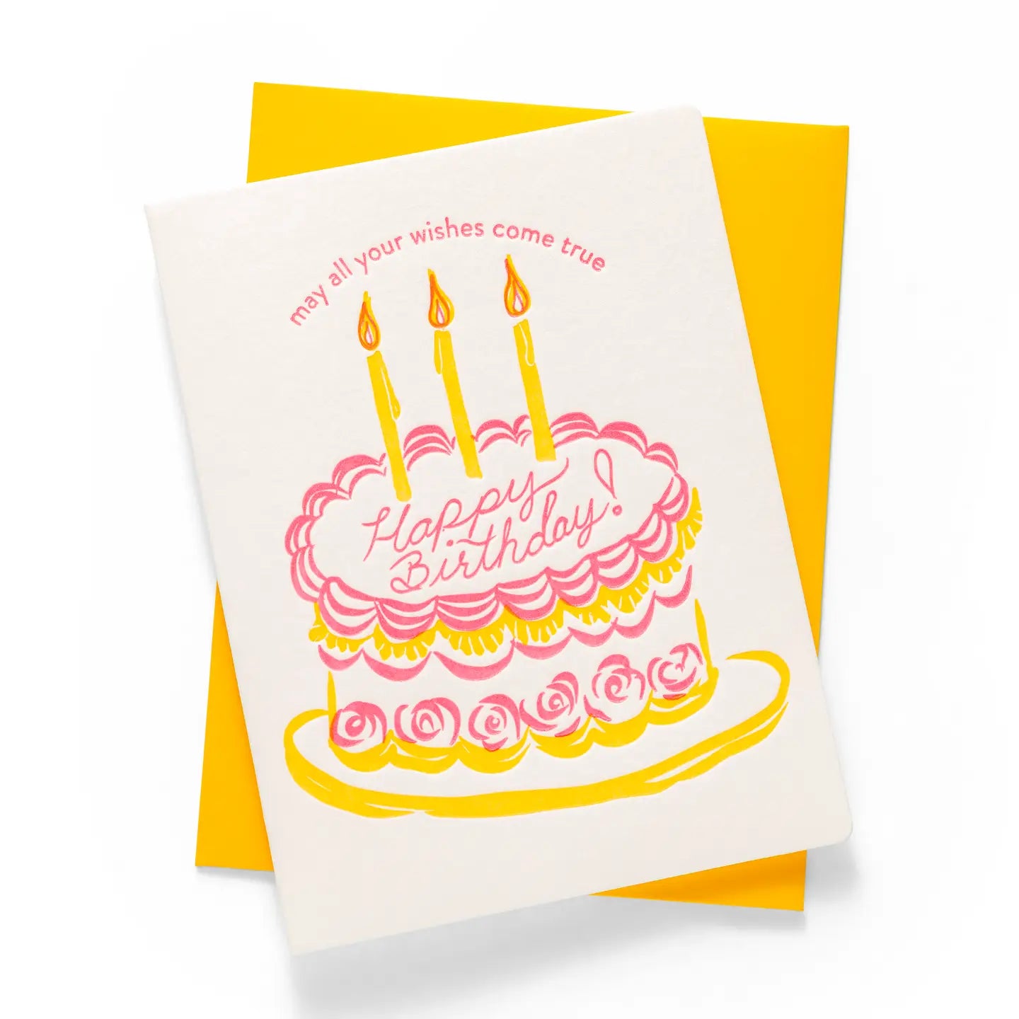 Birthday card with a cake illustration and candles on a yellow envelope