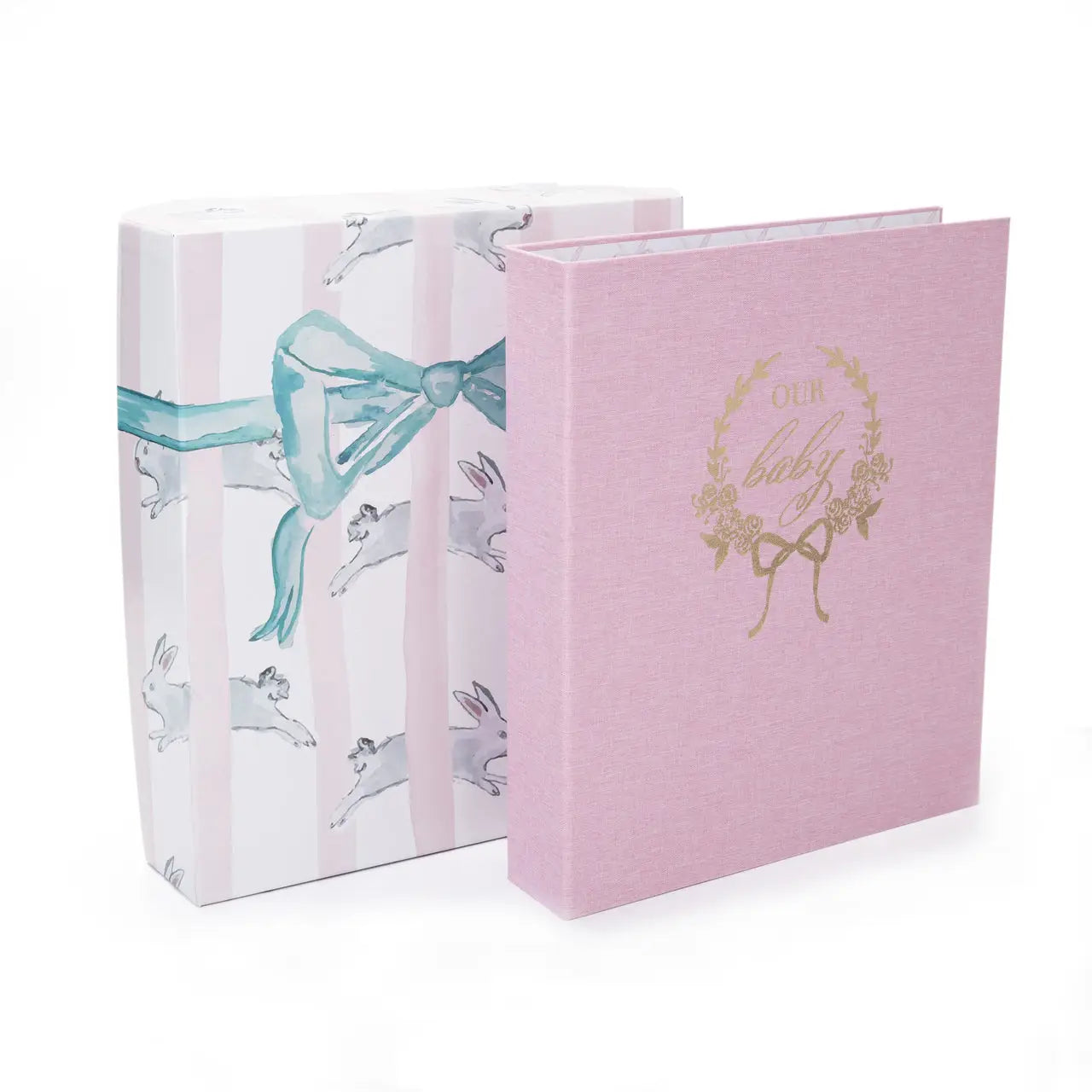 Pink baby album with decorative cover and matching box on a white background
