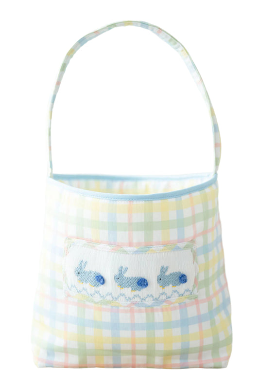 The Blue Smocked Bunnies Easter Basket has a sturdy handle with a 9" drop, making it easy for little ones to carry during Easter egg hunts.