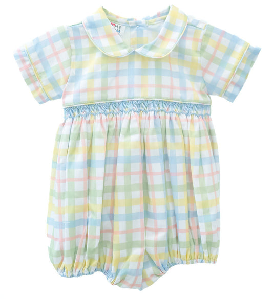 The little boy is wearing the Pastel Smocked Easter Plaid Arthur Bubble, and its cheerful colors are perfect for spring.