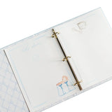 Open notebook with a ring binder on a white background