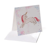 Greeting card with a unicorn illustration on a watercolor background