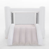 White inflatable baby playpen on a white background