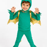 Child wearing a green and gold dragon costume on a white background