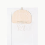 Beige basketball backboard with hoop on a white background