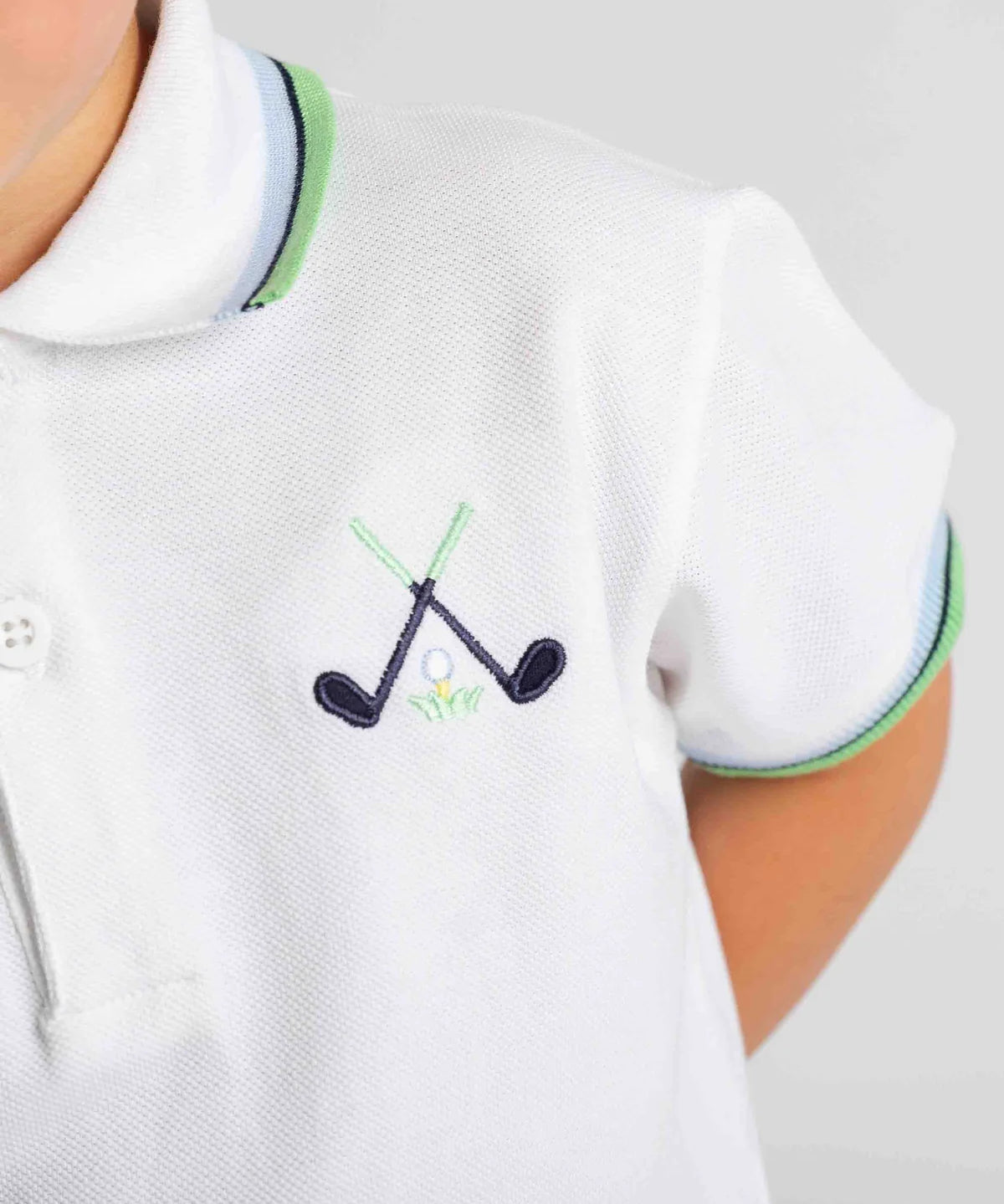 Knit Polo With Golf Clubs
