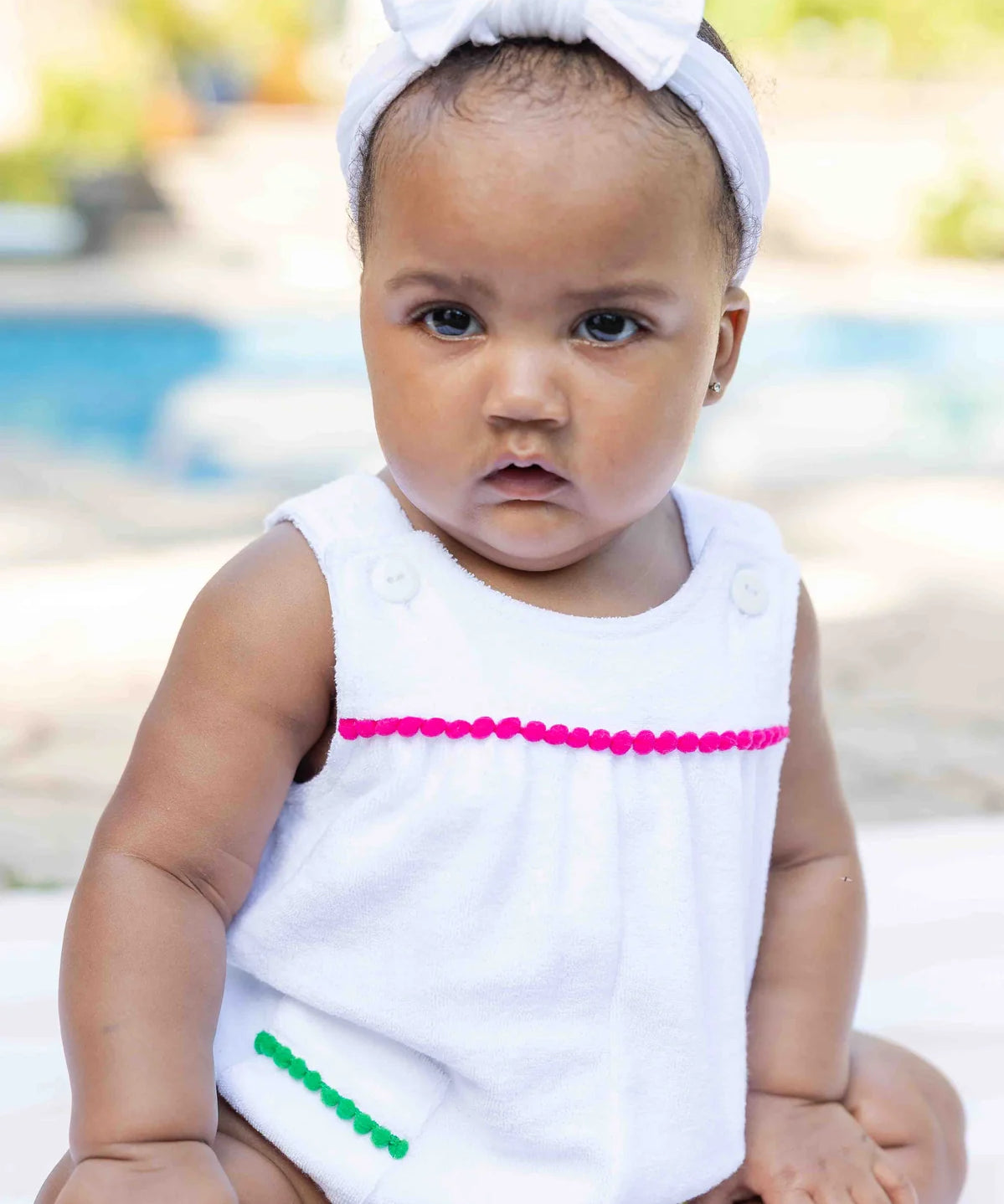 Terry Romper With Pom Poms