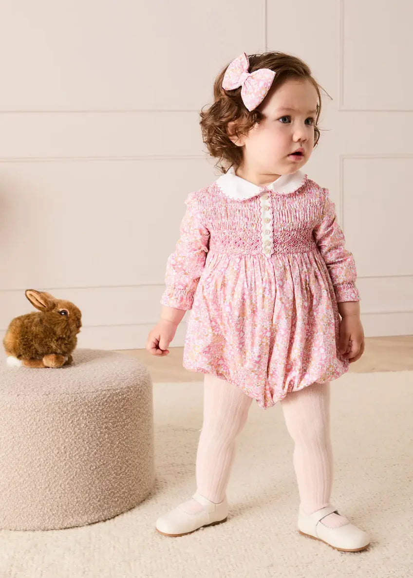 Nellie Floral Hand Smocked Long Sleeve Romper in Pink