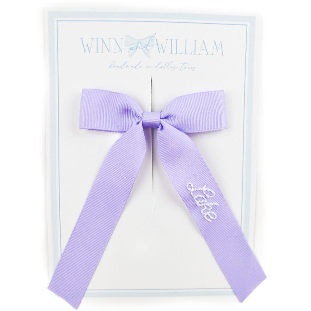 Winn and William hand stitched name hair bow