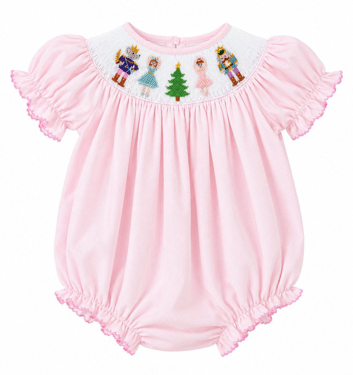 A pink baby romper with short flutter sleeves, elasticized ruffled hem and cuffs, and a white embroidered yoke featuring nutcracker figures, a princess, and a Christmas tree.