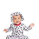 Baby wearing a Dalmatian costume on a white background