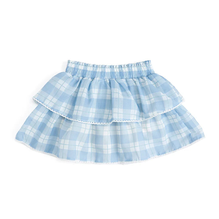 Sweet and twirl-worthy, this tiered skort pairs soft blue plaid with a delicate scalloped trim for a look that’s equal parts playful and polished.

Features:

Blue plaid skort with delicate white trim
2 tiers with attached shorts inside
Smocked waistband
Care: Machine washable, lay flat to dry