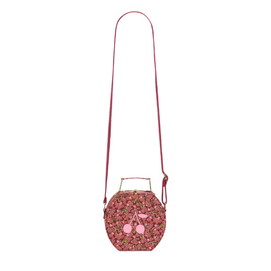 This Jadore mini satchel bag is covered with cotton Liberty fabric featuring a warm print. A large contrasting cherry on the front adds a pop of color.



Cotton poplin
Adjustable strap and handle
Measurements: 13 x 5.5 x 7.5 cm (5.1 x 2.2 x 3 in)
Composition : 100% Cotton