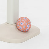 Floral-patterned ball on a white background