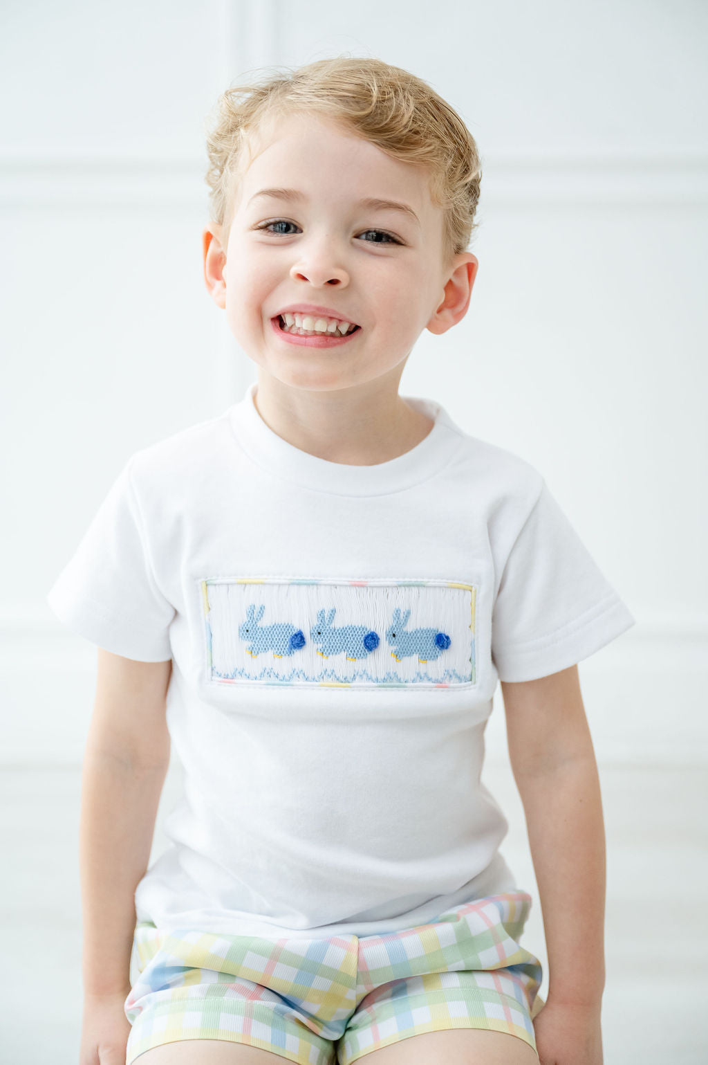 The Smocked Easter Bunnies T-Shirt and Short Set is made with a 100% cotton shirt, ensuring softness and comfort for your little one.