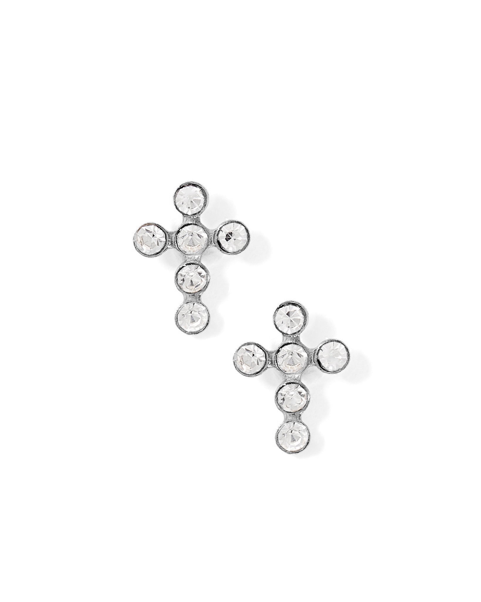 Gold and crystal stud earrings on a white background