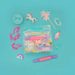 Unicorn-themed playdough set with tools and accessories on a blue background, featuring the brand 'Young & Wild'.