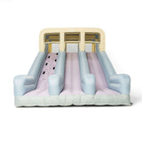 Inflatable slide with pink and blue gradient on a white background