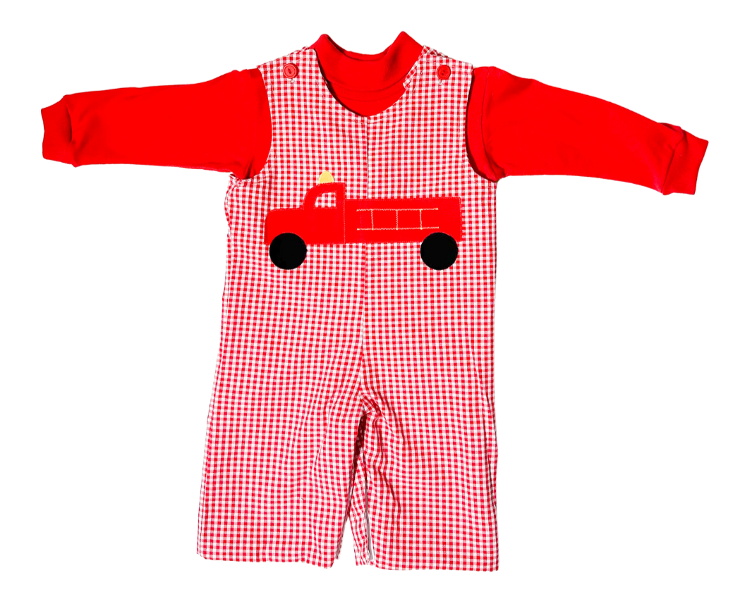 Santa and Firetruck Reversible Longall over a red turtleneck by Funtasia Too.